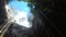 Diving out of the water with view to the circle shaped limestone cenote `San Lorenzo Oxman` near Valladolid, Mexico