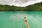 Diving into wonderful blue green tropical lagoon