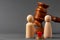 Divorse property division concept. Wooden family with house and judge gavel
