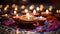 Diwali Clay Diya lamps candles lit during Dipavali, Hindu festival of lights celebration blue pink orange
