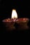 Diwali clay lamp lights diya reflection image