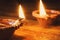 Diwali festival lamp on wooden background