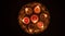 Diwali, Hindu festival of lights celebration. Diya oil lamps against dark background