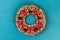 Diy Christmas pasta wreath on blue background. Gift idea, decor Christmas, Xmas, New Year