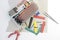 DIY electronics hobby kit opened heatshrink laying around on the grey background. DIY engineer electronic kit set.