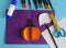 Diy Halloween card with pumpkin on purple background.Gift idea, decor Halloween.Instruction.Step by step.Top view. Children