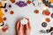 DIY Halloween gingerbread cookie. Step 2, cover the pumpkin shape with the base with white icing