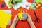 DIY instruction. The process of making a paper heart from yellow and gray colored paper for Valentine\'s Day