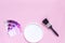 DIY minimalist design concept. Trendy color samples - pink, lilac, purple, magenta and paint brush on pink background