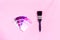 DIY minimalist design concept. Trendy color samples - pink, purple, magenta and paint brush on pink background. Repair