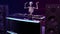 DJ Bones, human skeleton playing music on turntables, skeleton on stage with disc jockey audio equipment, 3D render