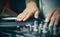 Dj scratches vinyl record with music on turntables