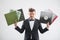 DJ in tuxedo showing his vinyl records standing by