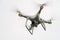 DJI Phantom 4 Pro quadcopter drone with digital camera 4K flight in overcast white sky, takes pictures