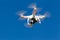 DJI Phantom drone in flight with a mounted GoPro Hero3+ Black Ed