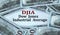 DJIA - acronym on the background of cash dollar bills