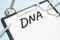 DNA photo. Figure of adrenal glands with stethoscope, lab test tubes, note labeled cortisol