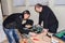 Dnepr, Ukraine - February 09, 2017:  Two master service center repair the motherboard of a powerful server