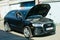 Dnepropetrovsk, Ukraine - 06.08.2022: AUDI Q3 in black. Subcompact luxury crossover Audi Q3. Close-up of the engine and contents