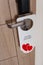 Do not disturb sign at the door of honeymoon suite