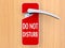 Do not disturb sign hanging on door