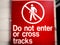 Do not eater or cross tracks sign - image