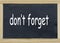 Do not forget written on a chalkboard