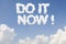 Do it now concept text in clouds