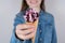 Do you want to taste? Cropped closeup photo of positive satisfied girl giving you showing to camera how to look her favorite color