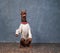 A Doberman wears sweater, performs command Bunny