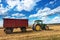 Dobrich, Bulgaria - July 08: Modern John Deere tractor in the field near the town Dobrich, Green tractor on the agricultural