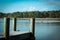 Dock on bay in North Florida over peaceful waters