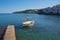 Dock and boat in Cadaques Bay