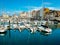 Dock of Gijon, Asturias, Spain, full of boats on calmed sea and