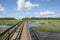 A dock goes out over the coastal salt marsh on the coast of South Carolina near Beaufort