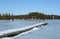 Dock leading onto a frozen lak