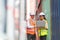 Dock manager woman and engineer worker looking at laptop and check stock in shipping container yard with smile. Import and export