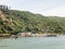 Dock at the mouth of the Valdivia River, with fishing boats moored in the harbor. Valdivia, River Region, southern Chile