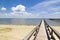 Dock, ocean, and clouds