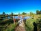 dock walkway with the bottom of a well by day