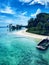 Docked fishing boat on Island, crystal clear water, neil island