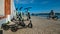 Dockless electric shared scooters parked on the promenade overlooking the Tagus and 25 April Bridge in Belem, Lisbon