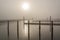 Docks on the island Schiermonnikoog in a misty sunshine