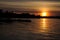 Docks on the Lake Under the Setting Sun