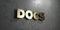 Docs - Gold sign mounted on glossy marble wall - 3D rendered royalty free stock illustration