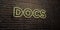 DOCS -Realistic Neon Sign on Brick Wall background - 3D rendered royalty free stock image