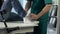 Doctor bandaging patients leg, injury treatment in rehabilitation center, health