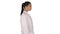 Doctor beautician in a white robe is walking on white background.