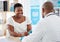 Doctor, black woman and healthcare consultation with a wellness and hospital worker in office. Consulting, patient and
