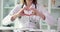 Doctor cardiologist shows heart gesture in clinic closeup